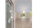 Bright foyer leads to a spacious living area with new floors and natural light at 7431 Sw 129Th Pl, Ocala, FL 34473