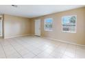 Spacious living room with tile flooring and natural light at 98 Pinata Ct, Kissimmee, FL 34743