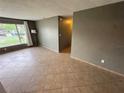 Living room featuring tiled floors, and neutral paint at 31 S Edgemon Ave, Winter Springs, FL 32708