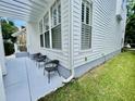 Back patio features a pergola and seating area, perfect for outdoor relaxation at 907 Pawstand Rd, Celebration, FL 34747