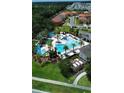 Aerial view of the community pool surrounded by lush landscaping and a variety of recreational amenities at 2386 Rama Dr, Kissimmee, FL 34746