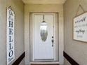 Inviting front entryway with charming decor creating a warm and welcoming atmosphere at 3110 Short Leaf Pine Ct, Kissimmee, FL 34746
