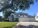 Charming two-story home featuring a two-car garage and well-maintained landscaping at 3170 Zaharias Dr, Orlando, FL 32837