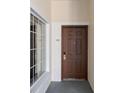 Condo front door with sidelight window and unit number at 8601 Worldquest Blvd # B1/U3502, Orlando, FL 32821