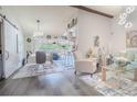 Open-concept living area with modern décor, stylish furniture, and natural light at 987 Trumbull St, Deltona, FL 32725