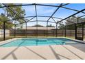 Refreshing screened-in pool with a spacious deck, perfect for outdoor entertaining and relaxation at 4412 Mesa Verde Dr, St Cloud, FL 34769