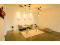 Inviting lobby area with stylish pendants, comfortable seating, and modern decor at 5245 W Irlo Bronson Memorial Hwy # 148, Kissimmee, FL 34746