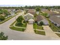 Lovely home in a quiet residential neighborhood with mature trees and well-maintained lawns at 2411 Parsons Pond Cir, Kissimmee, FL 34743