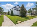 Well-maintained lawn and garden surrounding the property at 8378 Randal Park Blvd, Orlando, FL 32832