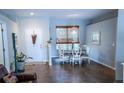 Cozy dining nook featuring tile flooring and a view of the front yard at 2341 Stone Cross Cir, Orlando, FL 32828