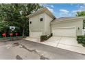 Two car garage with a basketball hoop in the driveway at 1321 Artisan E Ave, Celebration, FL 34747