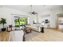 Bright living room with high ceilings and open floor plan, perfect for modern living at 517 Milano Rd, Poinciana, FL 34759