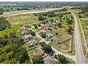 Expansive aerial view of a suburban neighborhood featuring well-maintained homes and spacious lots at 6006 Country Walk Ln, Winter Haven, FL 33880