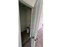 Powder room with tile floors and white toilet at 1140 Merrill St, Davenport, FL 33837