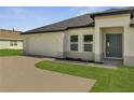 Charming one-story home featuring a two car garage, neutral paint scheme and simple landscaping at 502 Viceroy Ct, Kissimmee, FL 34758