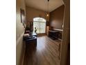 Comfortable home office with ample natural light and wooden floors at 6480 Fall St, St Cloud, FL 34771