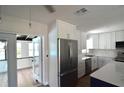 Beautiful kitchen featuring stainless steel appliances and modern lighting at 894 Superior St, Deltona, FL 32725
