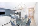 Bright, open living space with modern kitchen, dining area, and comfortable lounge at 4832 Dedication St, Kissimmee, FL 34746