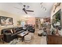 The view from the living room reveals an open-concept design connecting the living, dining, and kitchen areas at 7521 Pellham Way, Kissimmee, FL 34747
