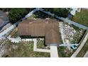 Aerial view of a single story home featuring a fenced yard and mature trees surrounding the property at 114 N Alderwood St, Winter Springs, FL 32708