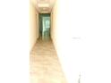Hallway with tile flooring that leads into the house at 8607 Crescendo Ave, Windermere, FL 34786