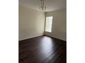 Dining room with hardwood floors and a chandelier at 2828 Club Cortile Cir # B, Kissimmee, FL 34746