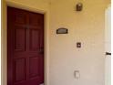 Close-up of the front door of Unit 2828B with visible apartment number at 2828 Club Cortile Cir # B, Kissimmee, FL 34746
