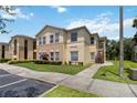 Charming condo building featuring well-kept landscaping and convenient stair access at 2828 Club Cortile Cir # B, Kissimmee, FL 34746