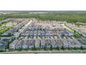Aerial view of a community showcasing the neighborhood's layout and green spaces at 11037 Bagley Aly, Windermere, FL 34786