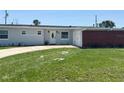 Charming single-story home with fresh grass and a welcoming front entrance at 1126 Orwell Ave, Orlando, FL 32809