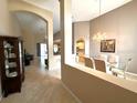 Open concept dining area with view to the kitchen and living room and features tile flooring at 401 Chinahill Ct, Apopka, FL 32712