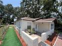 Attractive single-story home with a pleasant patio area and manicured yard at 1101 28Th Nw St, Winter Haven, FL 33881