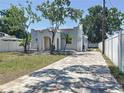 Attractive single Gathering home with brick paved driveway and well maintained lawn at 2409 E Magnolia St, Lakeland, FL 33801