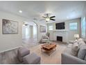 Spacious living room featuring modern decor, fireplace, and an open layout at 2409 E Magnolia St, Lakeland, FL 33801