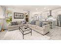 Bright living room featuring neutral tones, plush seating, and lots of natural light at 2057 Celebration Blvd, Kissimmee, FL 34747