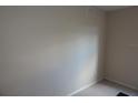 Neutral bedroom featuring a wall with carpet flooring and base trim at 3001 Greystone Loop # 106, Kissimmee, FL 34741