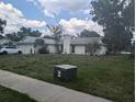 View of the front of the house from the street at 4345 Old Colony Rd, Mulberry, FL 33860