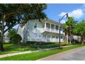 Charming two-story condo with a beautifully maintained lawn and verdant landscaping at 7468 Excitement Dr # 101, Reunion, FL 34747
