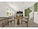 Open-concept living space with views of the kitchen, dining area, and an abundance of natural light at 4736 Homestead Trl, St Cloud, FL 34772