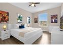Stylishly decorated bedroom with lots of light and white furniture at 2307 Silver Palm Dr # 304, Kissimmee, FL 34747