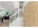 Inviting foyer with staircase, offering a glimpse into the home's open layout at 9128 Stromboli Ct, Kissimmee, FL 34747