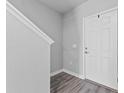 Inviting entryway featuring a white door and modern flooring, creating a clean and welcoming atmosphere at 3926 Palazzo Pl, Winter Haven, FL 33884