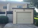 Exterior shot of the unit's garage and exterior entrance at 416 Howard Ave # D, Lakeland, FL 33815