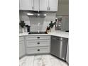 Bright kitchen featuring modern stainless appliances and lots of counter space at 426 Cardinal Ct, Kissimmee, FL 34759