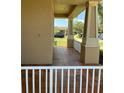 Spacious front porch area with brick tile flooring and decorative columns for relaxed outdoor living at 9721 Old Patina Way, Orlando, FL 32832