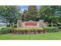 Ardmore Reserve entrance sign with lush landscaping, stone pillars, and a welcoming ambiance at 1021 Golden Dawn Loop, Minneola, FL 34715