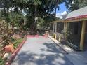 Paver patio and landscaping in front of single story home at 822 5Th St, Orlando, FL 32824
