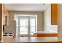 Open kitchen area showcasing an island, bay window, and lots of natural light at 3267 Villa Way Cir, St Cloud, FL 34769