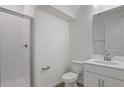 Clean and modern bathroom with a glass-enclosed shower and a stylish vanity at 630 Summit River Dr, Apopka, FL 32712