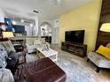 Open-concept living area showcasing seamless flow to the dining room and modern kitchen at 1106 Gran Bahama Blvd # 1106, Davenport, FL 33897